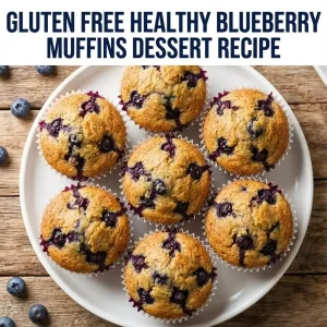 Close-up of moist Gluten Free Healthy Blueberry Muffins arranged on a white plate, bursting with fresh blueberries, with the text title 'Gluten Free Healthy Blueberry Muffins Dessert Recipe' overlay.